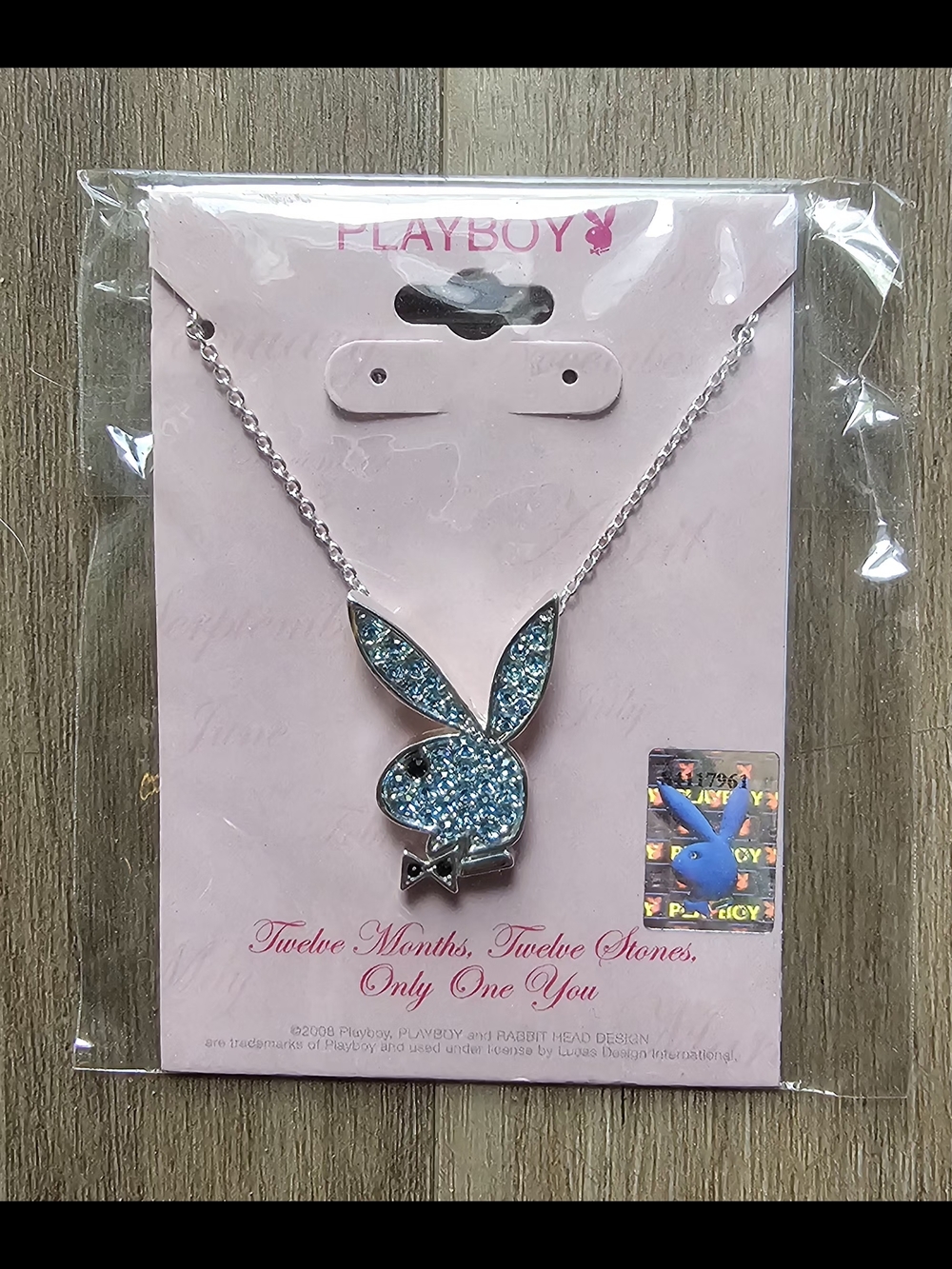PLAYBOY Silver Necklace with Blue Sparkly Bunny Logo Pendant